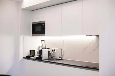 Cuisine ou kitchenette dans l'établissement BORD EAU Guest House