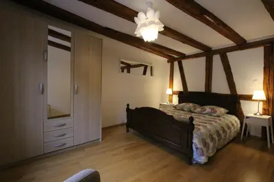 Un ou plusieurs lits dans un hébergement de l'établissement Colmar Historic Center - Alsacian Appartement PETITE VENISE 2 - BookingAlsace