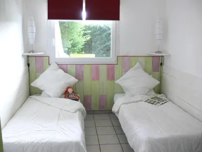 Un ou plusieurs lits dans un hébergement de l'établissement Gîte la Sapinière