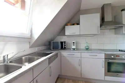 Cuisine ou kitchenette dans l'établissement Gîte Aux Deux Clochers