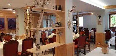 Coin salon dans l'établissement Hostellerie Les Bagenelles