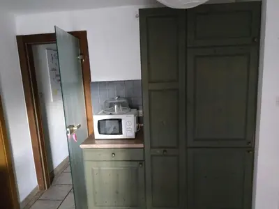 Cuisine ou kitchenette dans l'établissement Chez Chris & Ju