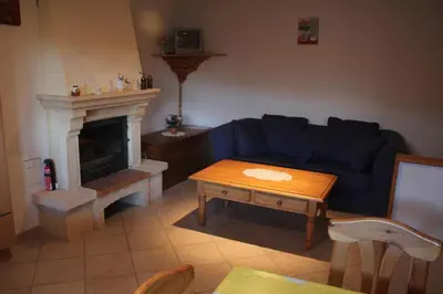Coin salon dans l'établissement Gîte Bretz