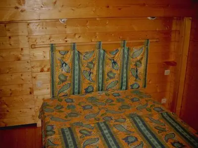 Un ou plusieurs lits dans un hébergement de l'établissement Chalet Helalph
