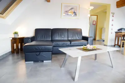 Coin salon dans l'établissement La maison du Vignoble