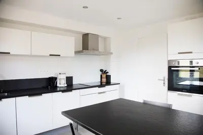 Cuisine ou kitchenette dans l'établissement La maison de Paul
