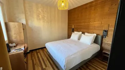 Un ou plusieurs lits dans un hébergement de l'établissement Annexe by Hôtel La Réserve