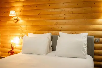 Un ou plusieurs lits dans un hébergement de l'établissement Annexe by Hôtel La Réserve