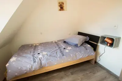Un ou plusieurs lits dans un hébergement de l'établissement Le Divin Gîte Classé 4 étoiles