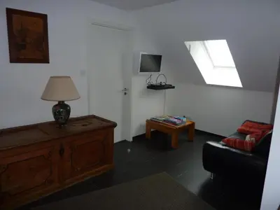 Télévision ou salle de divertissement dans l'établissement Gites Chez Schangala