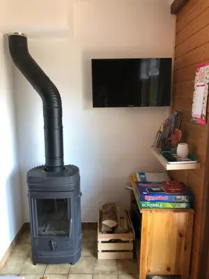 Télévision ou salle de divertissement dans l'établissement Chalet LE TREMPLIN - wifi, BBQ, parking