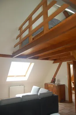 Un ou plusieurs lits dans un hébergement de l'établissement Le gîte à l'ombre du tilleul