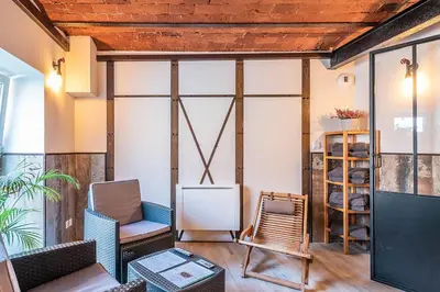 Coin salon dans l'établissement La Grange Ungersheim - Gîte