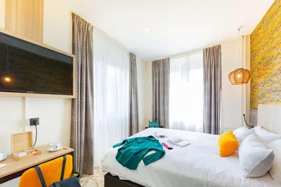 Un ou plusieurs lits dans un hébergement de l'établissement Best Western Mulhouse Salvator Centre