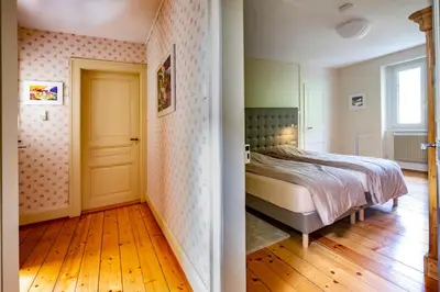 Un ou plusieurs lits dans un hébergement de l'établissement Françoise's Villa Luxury Hot Tub Mountain Ski - Munster