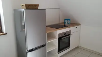 Cuisine ou kitchenette dans l'établissement Urlaub im Elsass