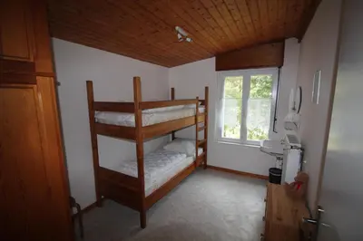 Un ou plusieurs lits dans un hébergement de l'établissement Gîte Les Jonquilles