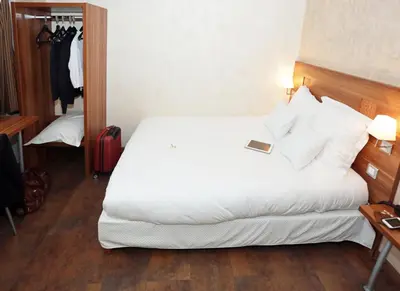 Un ou plusieurs lits dans un hébergement de l'établissement The Originals City, Hôtel Colmar Gare