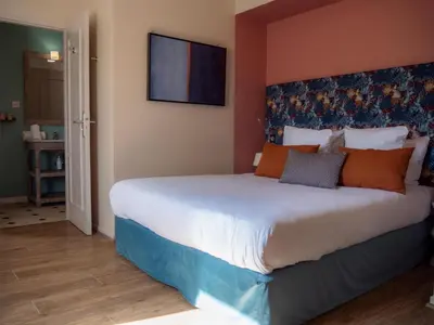 Un ou plusieurs lits dans un hébergement de l'établissement Hotel de la Bourse, Mulhouse Gare, Sure Hotel Collection by Best Western