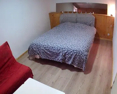 Un ou plusieurs lits dans un hébergement de l'établissement maison bleue