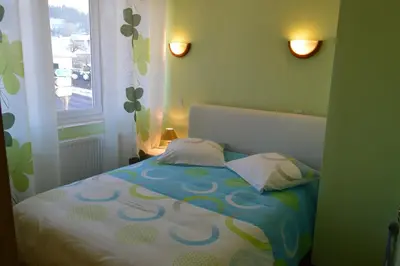 Un ou plusieurs lits dans un hébergement de l'établissement Hôtel Timgad