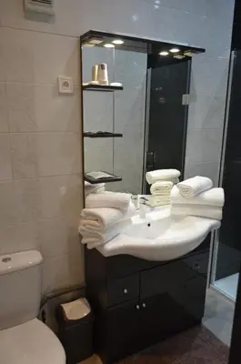 Salle de bains dans l'établissement Hôtel Timgad