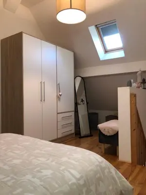 Un ou plusieurs lits dans un hébergement de l'établissement Gîte Chez Mathilde - hébergement de charme alliant cachet et modernité à 5 minutes de Colmar