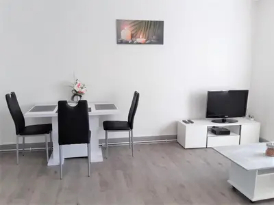 Télévision ou salle de divertissement dans l'établissement MyHome Basel 1B44