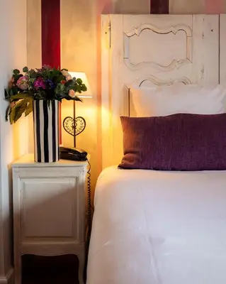 Un ou plusieurs lits dans un hébergement de l'établissement Hôtel Restaurant Verger des Châteaux, Route des vins Haut-Koenigsbourg