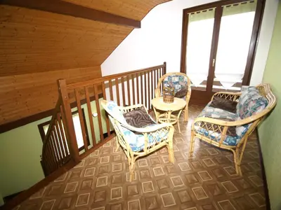 Coin salon dans l'établissement Elegant Chalet in Gerbépal in cosy environment