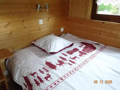Un ou plusieurs lits dans un hébergement de l'établissement Tiny-house