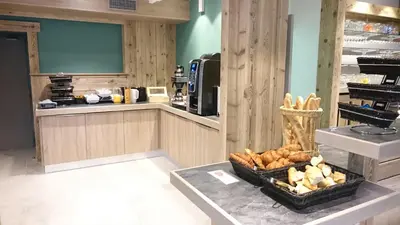 Cuisine ou kitchenette dans l'établissement Hôtel du Ô des Bluches