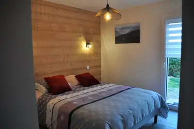 Un ou plusieurs lits dans un hébergement de l'établissement les charmes du lac Sauna et Spa