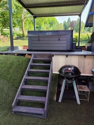 Barbecue disponible mis à disposition des clients de le chalet