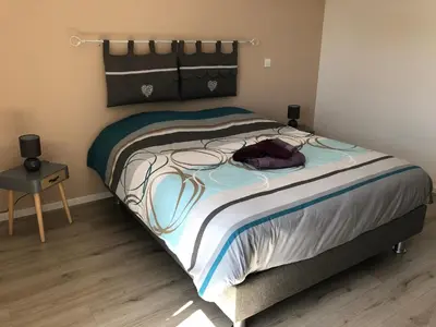 Un ou plusieurs lits dans un hébergement de l'établissement Appartement Magnîolia proche centre Ville
