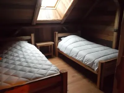 Un ou plusieurs lits dans un hébergement de l'établissement gîte 8 personnes 