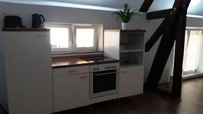Cuisine ou kitchenette dans l'établissement Ferien im Elsass