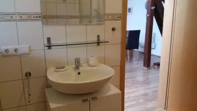 Salle de bains dans l'établissement Ferien im Elsass
