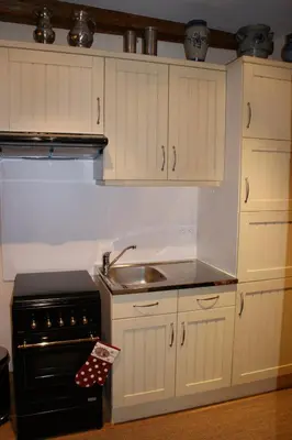 Cuisine ou kitchenette dans l'établissement Gîtes les bains