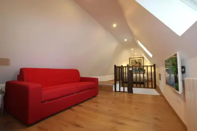 Coin salon dans l'établissement Chambre chez l'habitant - L Écureuil - Cœur de Riquewihr - 2 personnes