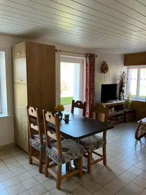 Télévision ou salle de divertissement dans l'établissement LES CŒURS DU TILLEUL