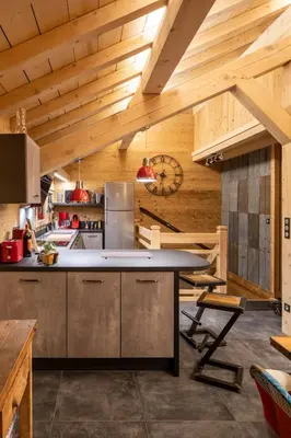 Cuisine ou kitchenette dans l'établissement Chalet Horizon 180 4 étoiles Sauna