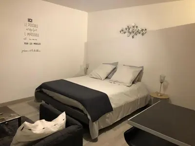 Un ou plusieurs lits dans un hébergement de l'établissement Beau Studio M Euroairport Basel-Freiburg
