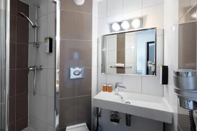 Salle de bains dans l'établissement Kyriad Belfort Centre Gare