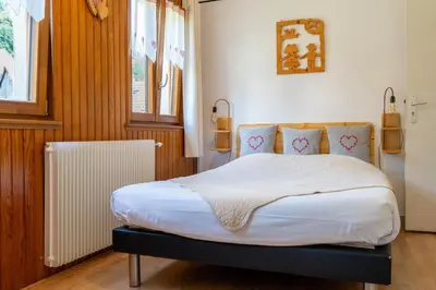 Un ou plusieurs lits dans un hébergement de l'établissement Chambres d'hôtes A la Fecht Nature et Bien-être