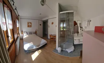 Un ou plusieurs lits dans un hébergement de l'établissement Chambres d'hôtes A la Fecht Nature et Bien-être