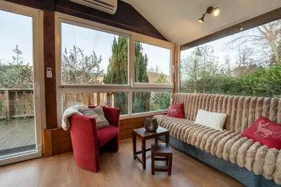 Coin salon dans l'établissement Au Chalet d'Aline - Atypique pour 4 personnes