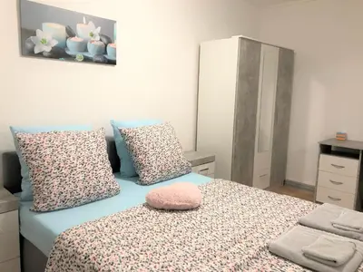 Un ou plusieurs lits dans un hébergement de l'établissement Comfort Stay Basel Airport RC46B