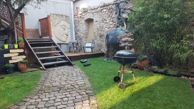Jardin de l'établissement Naova Cosy Studio