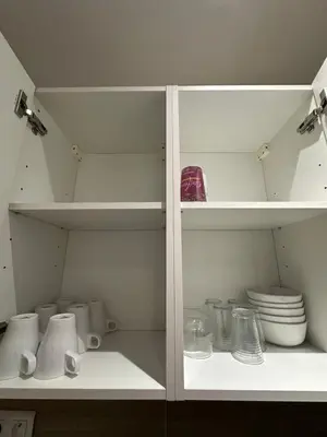 Cuisine ou kitchenette dans l'établissement Le 3 - Joli appartement T3 Mulhouse centre, Neuf, calme et tout équipé - stationnement gratuit